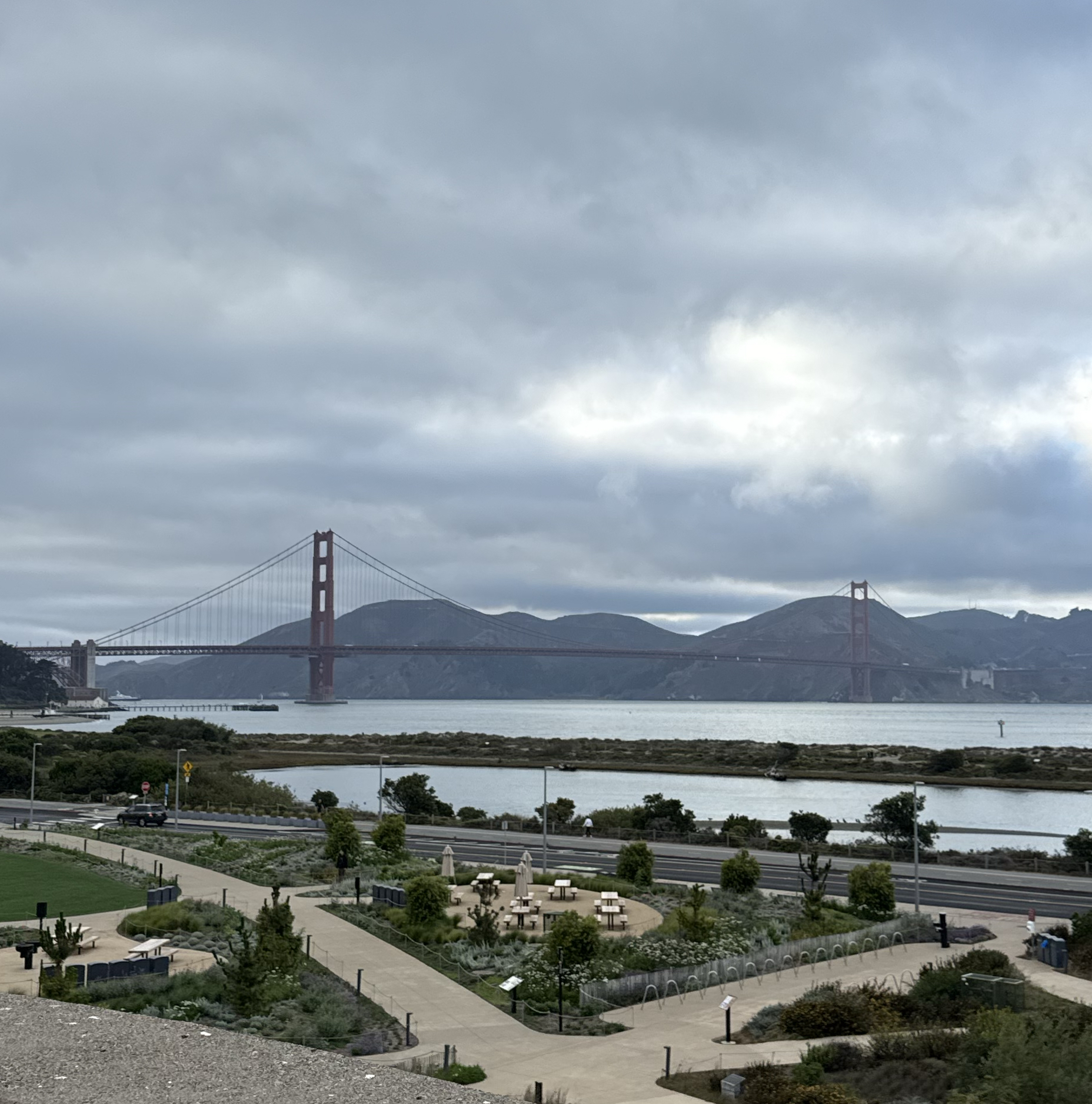 Golden Gate Bridge seen beyond the Presidio Tunnel Tops park and shoreline